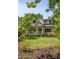 Charming home with a well-kept lawn and inviting front porch surrounded by lush landscaping at 164 Ridley Cir, Decatur, GA 30030