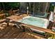 Inviting hot tub on a wooden deck, perfect for relaxation and outdoor enjoyment at 164 Ridley Cir, Decatur, GA 30030