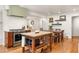 Kitchen with stainless steel oven, granite countertops, and a kitchen island for enhanced workspace at 164 Ridley Cir, Decatur, GA 30030