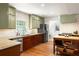 Charming kitchen featuring two-tone cabinetry, modern stainless steel appliances, and a breakfast bar at 164 Ridley Cir, Decatur, GA 30030
