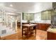 Bright and airy kitchen featuring stainless steel appliances, a center island, and hardwood floors at 164 Ridley Cir, Decatur, GA 30030