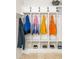 Mudroom area with a large white storage unit featuring hooks, shelving, and cabinets at 164 Ridley Cir, Decatur, GA 30030