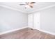 Bedroom with ceiling fan, windows, and neutral paint at 2607 Jefferson Ter, Atlanta, GA 30344