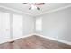 Bedroom with hardwood floors and light colored walls at 2607 Jefferson Ter, Atlanta, GA 30344