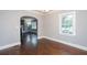 Open dining area with hardwood floors with views to living room at 2607 Jefferson Ter, Atlanta, GA 30344