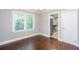 Dining area with hardwood floors, natural light and view into the kitchen at 2607 Jefferson Ter, Atlanta, GA 30344