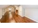 Second floor hallway with hardwood floors, white trim and stairway at 2607 Jefferson Ter, Atlanta, GA 30344