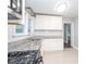 Updated kitchen featuring granite countertops, stainless steel appliances, and white cabinets at 2607 Jefferson Ter, Atlanta, GA 30344