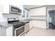 Updated kitchen with granite countertops and stainless steel appliances at 2607 Jefferson Ter, Atlanta, GA 30344