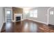 Hardwood floors and fireplace create inviting living space at 2607 Jefferson Ter, Atlanta, GA 30344