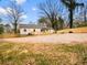 Spacious backyard featuring a wooden fence and grass, offering ample outdoor space at 2710 Hedgewood Nw Dr, Atlanta, GA 30311
