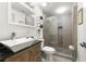 Bathroom with modern fixtures, including a square sink, granite countertop, and tiled shower at 2710 Hedgewood Nw Dr, Atlanta, GA 30311