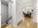 Bright hallway features light wood floors and leads to a kitchen and dining area at 2710 Hedgewood Nw Dr, Atlanta, GA 30311