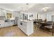Modern kitchen featuring stainless steel appliances, island and an eat-in dining area at 2710 Hedgewood Nw Dr, Atlanta, GA 30311
