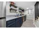 Well-lit kitchenette featuring stainless appliances and grey countertops at 2710 Hedgewood Nw Dr, Atlanta, GA 30311