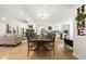 Open floor plan with living room, dining area, and kitchen featuring hardwood floors at 2710 Hedgewood Nw Dr, Atlanta, GA 30311