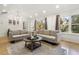 Bright living room featuring hardwood flooring and comfortable seating with lots of natural light at 2710 Hedgewood Nw Dr, Atlanta, GA 30311