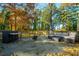 Inviting outdoor patio with lounge seating and bar area, perfect for entertaining at 2710 Hedgewood Nw Dr, Atlanta, GA 30311