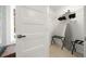 Bright walk-in closet with shelving and hangers, an ironing board, and luggage racks at 2710 Hedgewood Nw Dr, Atlanta, GA 30311