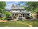 Backyard with deck, patio, and sunroom at 3322 Woodsfield Ne Dr, Marietta, GA 30062