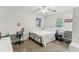 Bedroom featuring a bed, desk, comfortable chair, and plush carpet at 3322 Woodsfield Ne Dr, Marietta, GA 30062