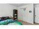 Bedroom with a sports theme, bed, basketball hoop, closet, and plush carpet at 3322 Woodsfield Ne Dr, Marietta, GA 30062