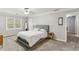 Comfortable bedroom with plush carpet, neutral walls, and a window for natural light at 3322 Woodsfield Ne Dr, Marietta, GA 30062