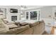 Spacious living room features a large window, neutral walls, fireplace and plush carpeting at 3322 Woodsfield Ne Dr, Marietta, GA 30062