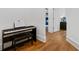 Hallway features hardwood floors and view to a bedroom and office/study area at 3433 Landen Pine Ne Ct, Atlanta, GA 30305