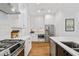 Modern kitchen design with stainless steel appliances, and custom cabinetry at 3433 Landen Pine Ne Ct, Atlanta, GA 30305