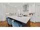 Spacious kitchen island with quartz countertop, ample storage, and stainless steel appliances at 3433 Landen Pine Ne Ct, Atlanta, GA 30305