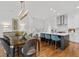 Elegant eat-in kitchen with modern island, stainless steel appliances, and beautiful hardwood floors at 3433 Landen Pine Ne Ct, Atlanta, GA 30305