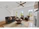Cozy living room featuring hardwood floors, a comfortable sofa, and a stylish coffee table at 3433 Landen Pine Ne Ct, Atlanta, GA 30305