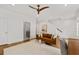 Cozy living area featuring a leather sofa, stylish rug, and modern decor at 3433 Landen Pine Ne Ct, Atlanta, GA 30305