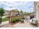 Inviting outdoor patio featuring comfortable seating and a barbecue grill for outdoor entertainment at 3433 Landen Pine Ne Ct, Atlanta, GA 30305