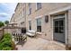 Comfortable patio seating with black and white seating, grill, and private entrance at 3433 Landen Pine Ne Ct, Atlanta, GA 30305