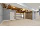 Unfinished basement with exposed utilities and concrete flooring at 1310 Ridgeview Rd, Auburn, GA 30011