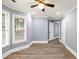 Spacious bedroom with hardwood floors and neutral paint at 1310 Ridgeview Rd, Auburn, GA 30011
