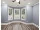 Bedroom featuring hardwood floors, recessed lights, and a bay window at 1310 Ridgeview Rd, Auburn, GA 30011