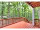 Wood deck with railings overlooking a wooded area at 1310 Ridgeview Rd, Auburn, GA 30011