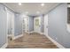 Inviting foyer with pristine trim, recessed lighting, and seamless access to various rooms at 1310 Ridgeview Rd, Auburn, GA 30011