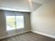 Carpeted bedroom featuring large windows and natural light at 4050 Sierra Vista Cirs, Cumming, GA 30040