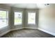 Bright bedroom filled with natural light and neutral carpet and paint at 4050 Sierra Vista Cirs, Cumming, GA 30040