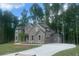 Beautiful two-story home featuring a long driveway and a meticulously landscaped front yard at 4050 Sierra Vista Cirs, Cumming, GA 30040