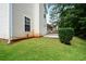 The spacious backyard features a well-maintained lawn and access to the home's exterior at 4438 Tuckahoe Ct, Douglasville, GA 30135