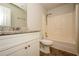 Bathroom featuring granite countertop, toilet and a tub at 4438 Tuckahoe Ct, Douglasville, GA 30135