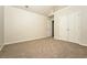 Bedroom with neutral carpet, closet and an entrance doorway at 4438 Tuckahoe Ct, Douglasville, GA 30135