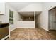 Bright dining area featuring an open floor plan with tile floors and vaulted ceiling at 4438 Tuckahoe Ct, Douglasville, GA 30135