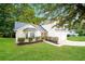 Well-kept lawn and landscaping accent this charming home's architectural features at 4438 Tuckahoe Ct, Douglasville, GA 30135