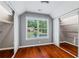 Cozy bedroom with hardwood floors, natural light, and ample closet space at 455 Firelite Ln, Suwanee, GA 30024